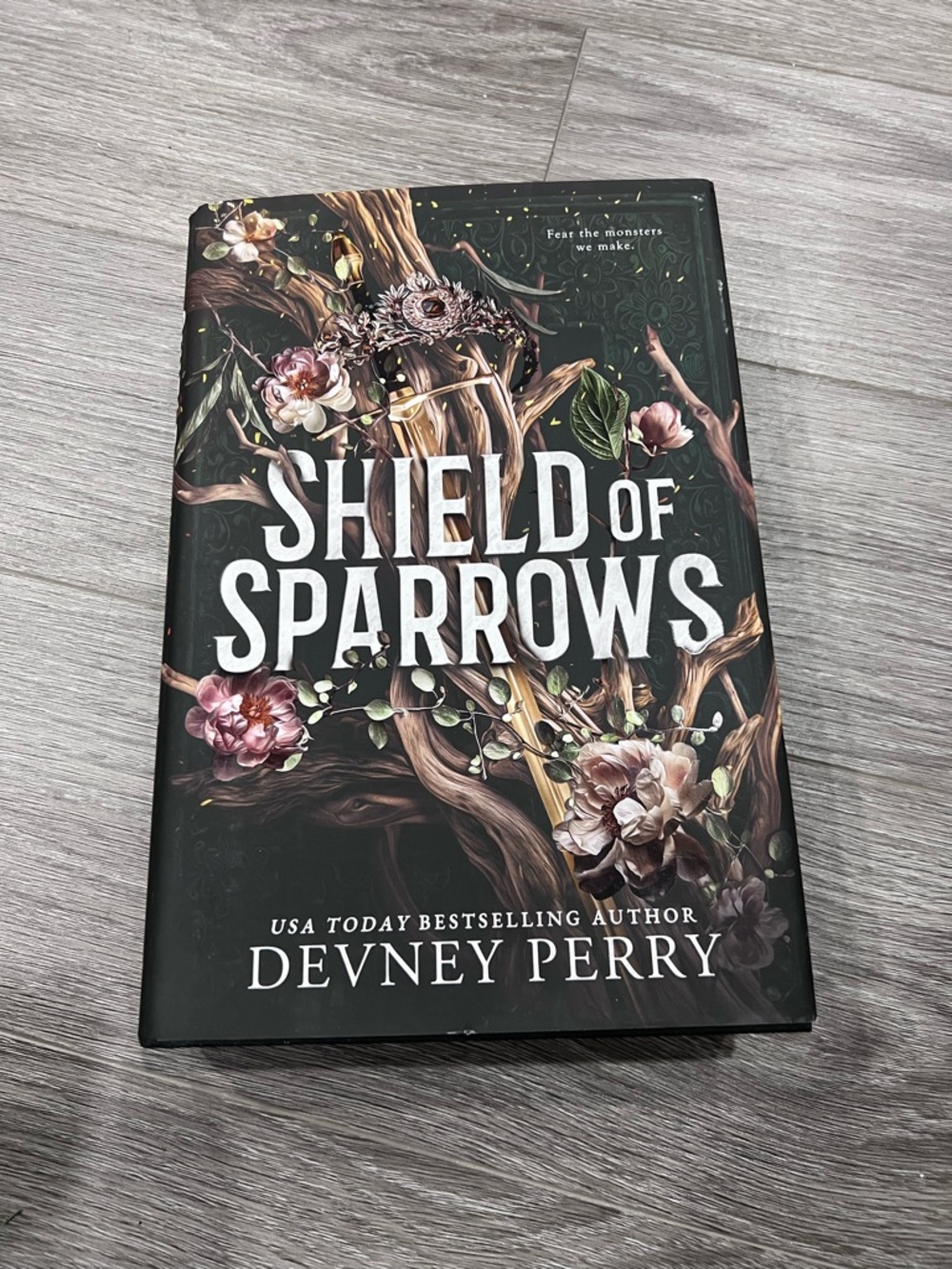 Indigo Dark Green Floral 'Shield of Sparrows' Hardcover Book